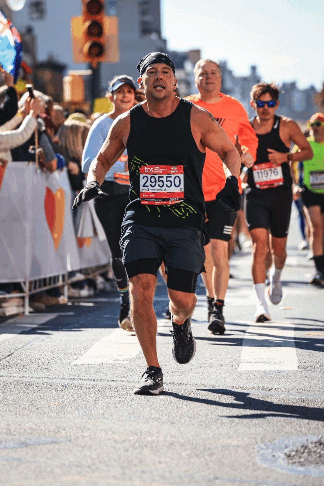 Michael Baker running the 2024 TCS New York City Marathon, wearing bib 29550
